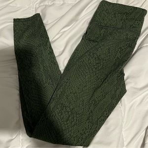 Green snake leggings